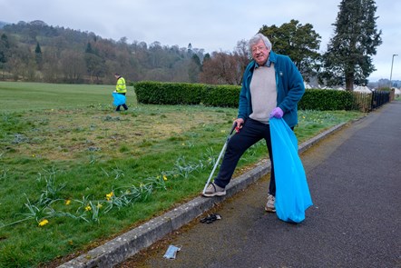 Darvel Improvement Group member George Gardner litter picking in Morton Park with Greener Communities