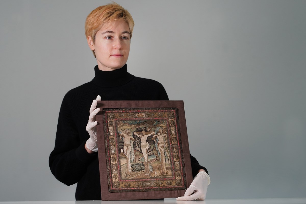 Helen Wyld, Senior Curator of Historic Textiles at National Museums Scotland, with the 17th century embroidery. Photo © Stewart Attwood (3)