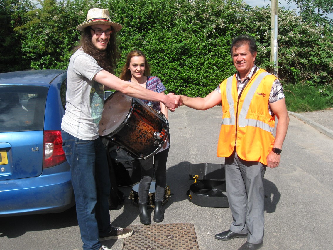 Morgan Pettigrew gets his rare stolen drumkit back from Network Rail engineer Derek Wahid-2