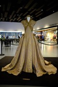 Sansa Stark (Season 3)  Wedding dress: The stunning gold wedding dress worn by Sansa Stark (Season 3) for her marriage to Tyrion Lannister at the Great Sept of Baelor.
