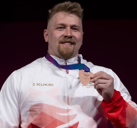 Andy Griffiths with his Commonwealth Games medal