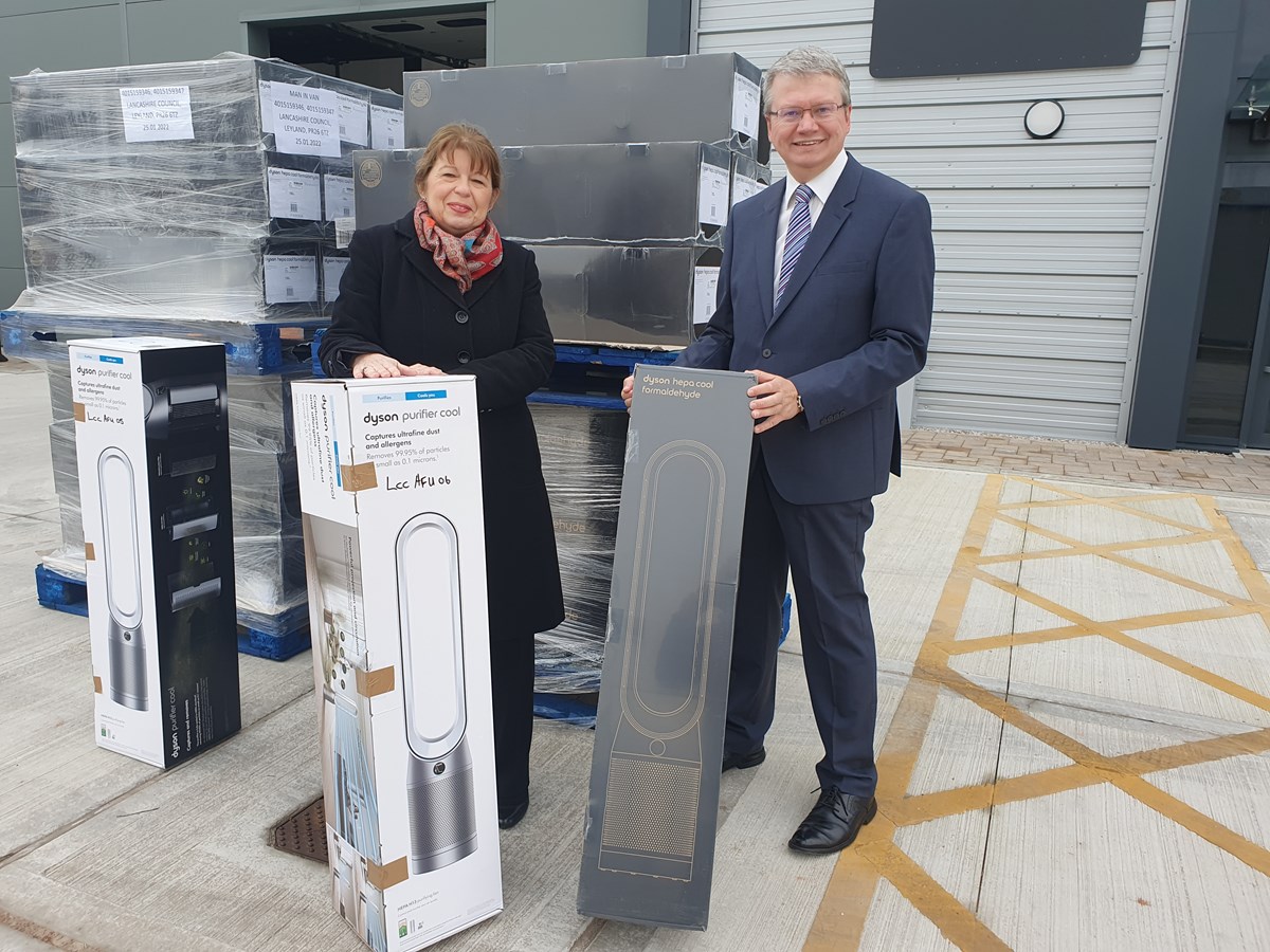 County Councillors Jayne Rear and Michael Green with ventilation equipment for schools