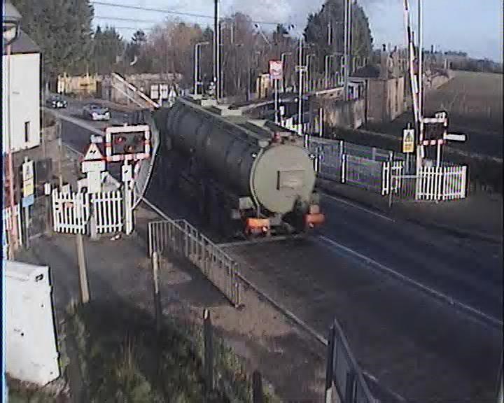 Tanker driver runs the risk at Foxton crossing, Cambs (4): Tanker driver runs the risk at Foxton crossing, Cambs (4)