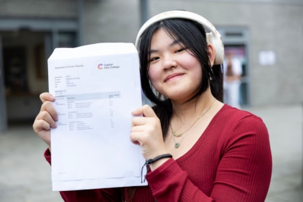 Capital City College Group student Keightly celebrates her results outside the Angel campus