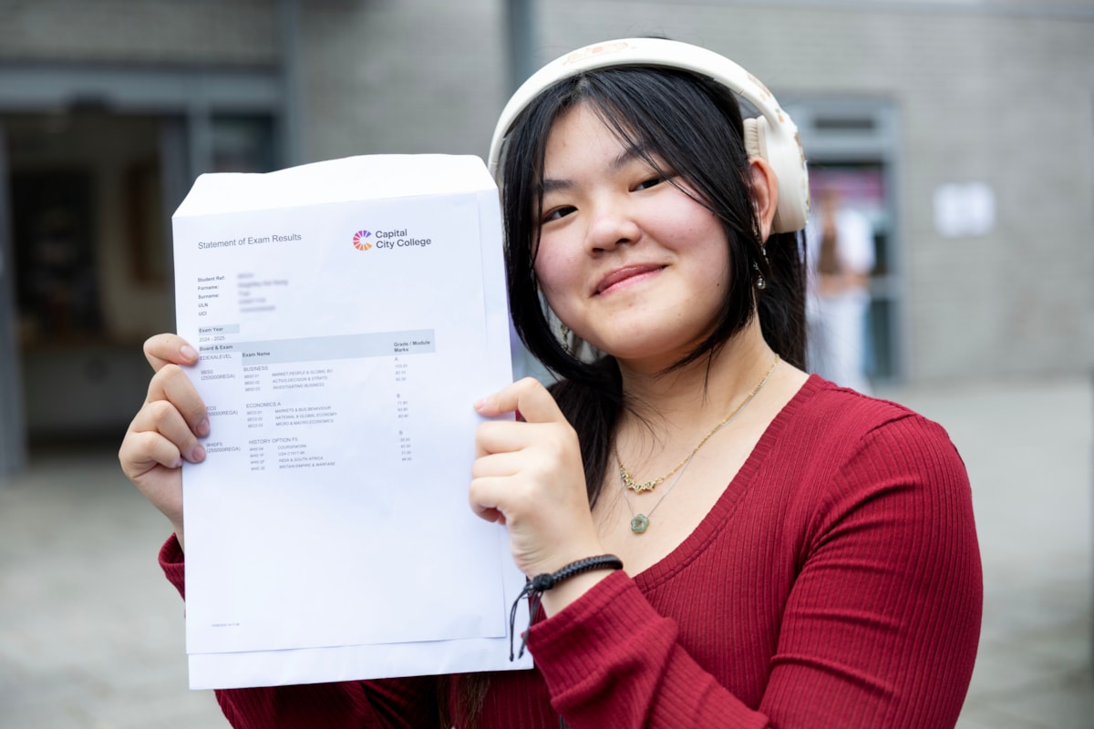 Capital City College Group student Keightly celebrates her results outside the Angel campus
