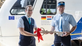 Arriva expands into new territories with launch of ‘Three-Country Train’: Pictured left is Arriva driver Björn Schoester handing over the train's ‘key’ to Belgian counterpart Gilles Dister (NMBS)