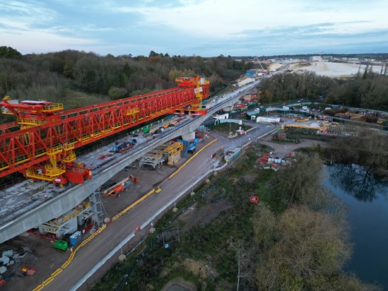 Colne Valley Viaduct, January 2023: View of the first 500 metres of completed viaduct and the giant bridge building machine, which is being used to install each of the 1,000 individual deck segments.