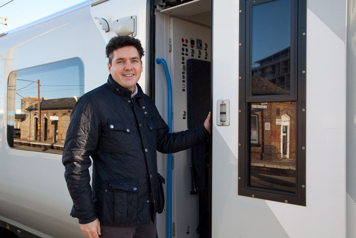 Rail Minister Huw Merriman boarding cab at Finsbury Park