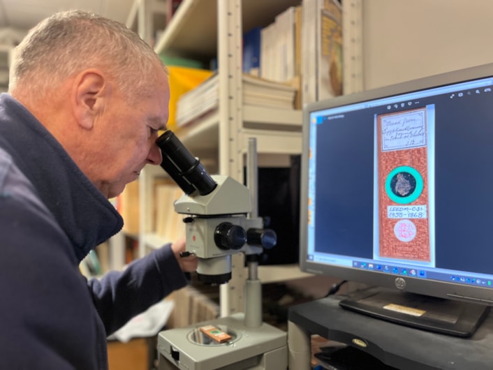 Microscope slides: Volunteer Stephen Crabtree uses a microscope to study the slides at the Leeds Discovery Centre.
Stored in small, wooden trays, the collection is thousands strong and is being painstakingly reviewed as part of a volunteer project.