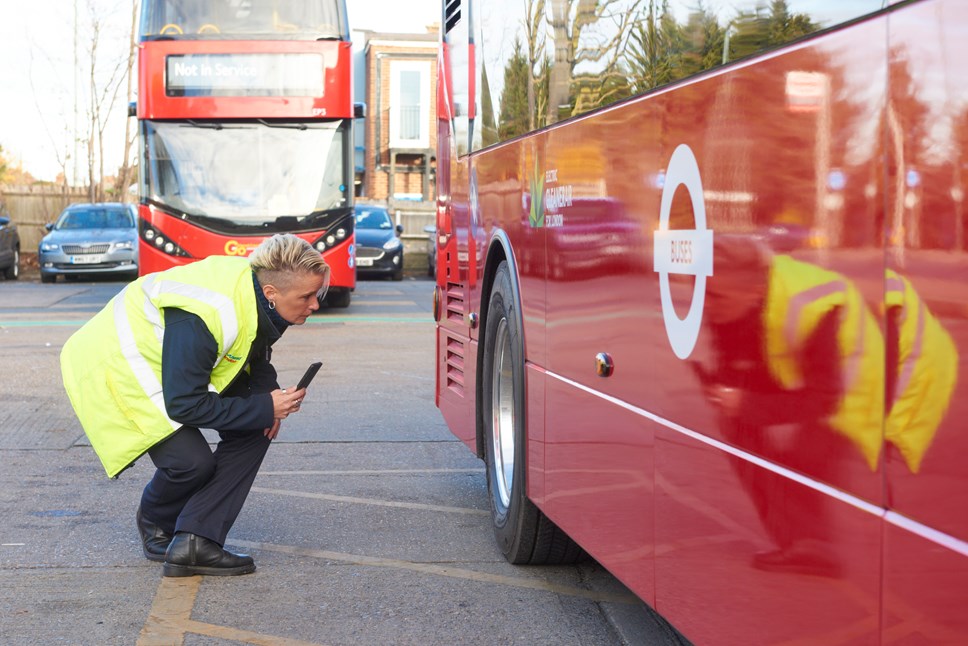 A bus driver, Kelly Myatt, carries out checks on a zero emission electric bus at Go-Ahead's Bexleyheath Depot in south-east London.