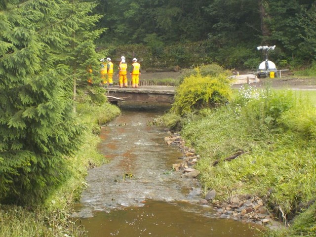 Water flowing near to the damaged track at Middlewood