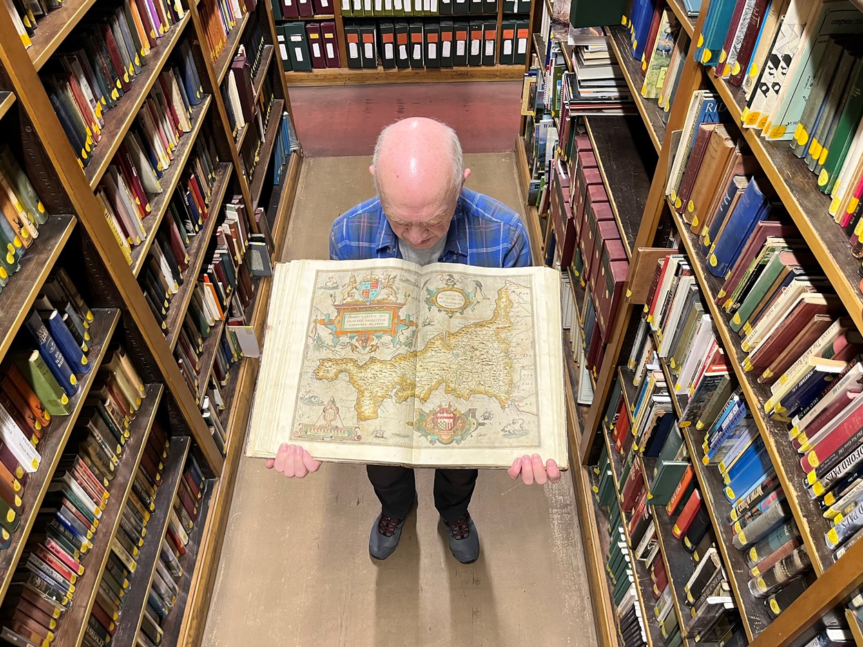 Saxton's Atlas: Philip Wilde, library assistant at Leeds Central Library with the atlas. Saxton’s Atlas, which he dedicated to Queen Elizabeth II, was completed in 1578 and after it was published the following year, it became the foundation for all subsequent county maps for more than a century after.
In fact Saxton’s Atlas was not fully replaced as the definitive geographical representation of England and Wales until Ordnance Survey began publishing one-inch maps in 1801.