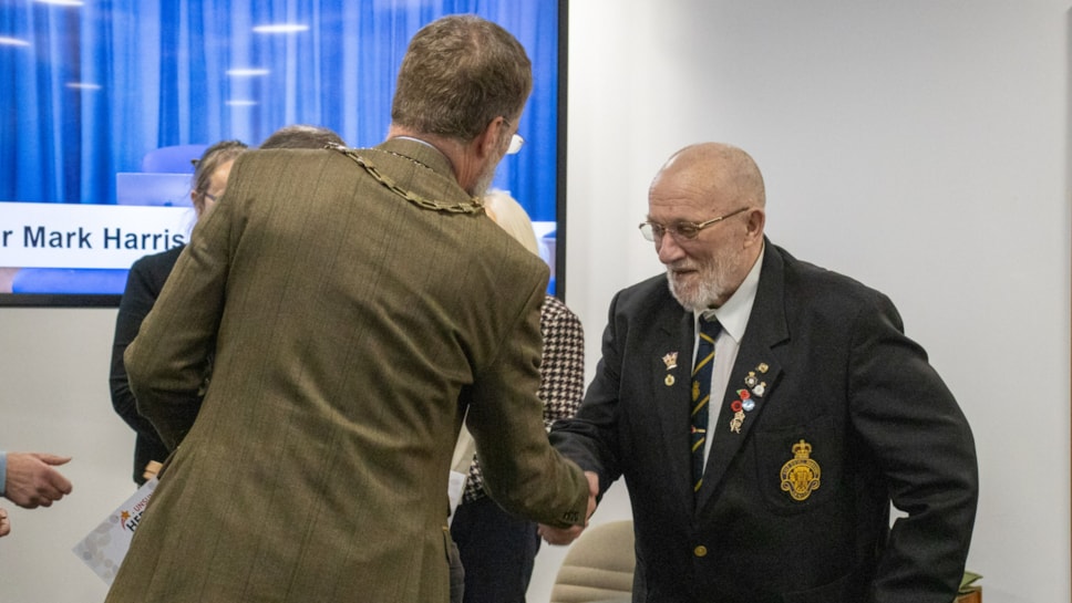 Allen Howe receiving his certificate