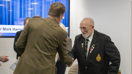 Allen Howe receiving his certificate