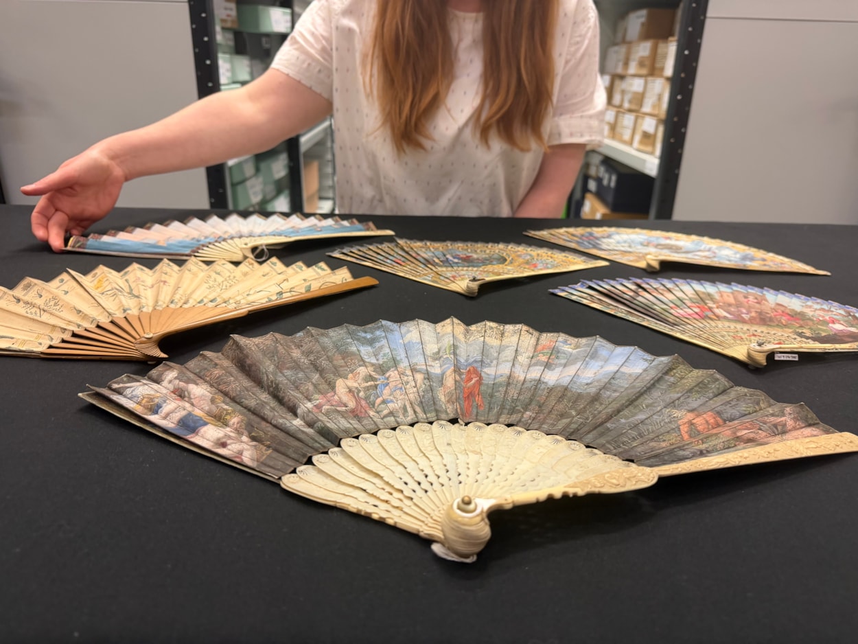 Antique fans: Curator Natalie Raw with a selection of some of the 400 antique fans cared for at Leeds Discovery Centre.
Mostly dating from the 18th and 19th centuries, many of the fans’ elaborate designs portray scenes of love taken from Greek or Roman mythology, colourful birds or Far Eastern imagery and were once a must-have accompaniment to any lady’s outfit in high society.