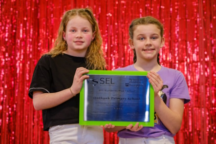 Lucy and Cara from P5 with the PATHS award