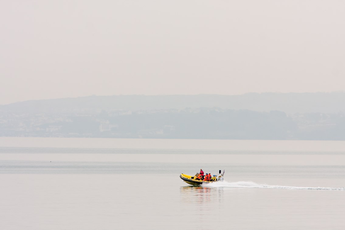 RIB at Teignmouth 5: Unmanned Aerial Vehicle (UAV) being launched from a Rigid Inflatable Boat (RIB) at Teignmouth as part of a geological survey to improve the resilience of the railway between Exeter and Newton Abbot