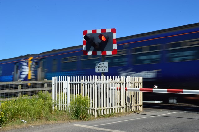 ScotRail train at Brasswell level crossing: ScotRail train at Brasswell level crossing