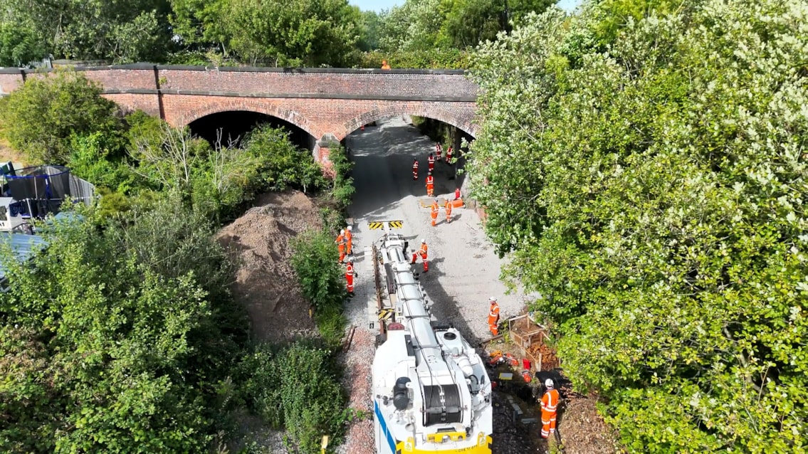 Track panels being lifted in by crane at Guide Bridge August 2026