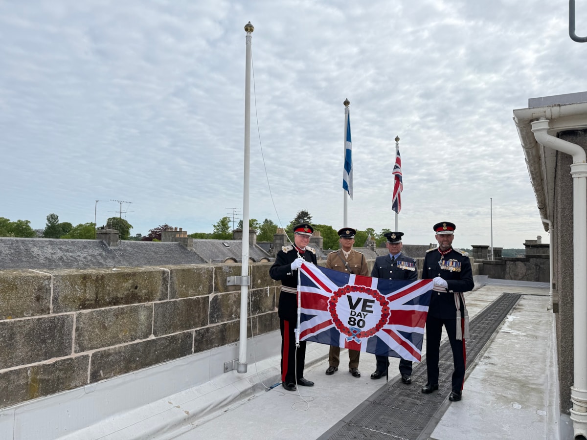 LL Banffshire, 39 Engineers, RAF Lossie and LL Moray with VE Day 80 flag
