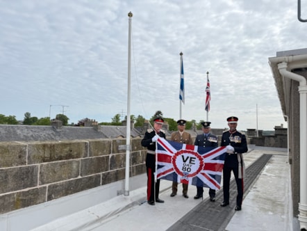 LL Banffshire, 39 Engineers, RAF Lossie and LL Moray with VE Day 80 flag