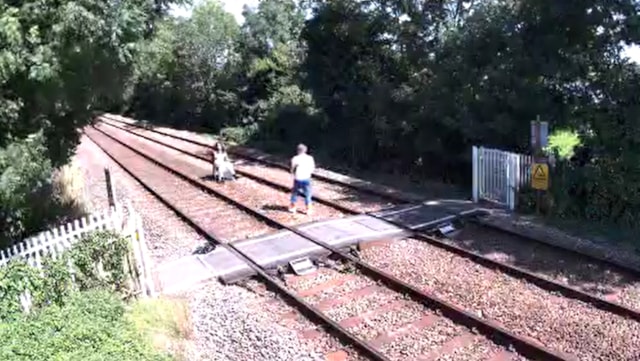 CCTV released to stop East Midlands trespass cases rising this summer: A photoshoot on the railway line at Chestnut Grove level crossing, Network Rail
