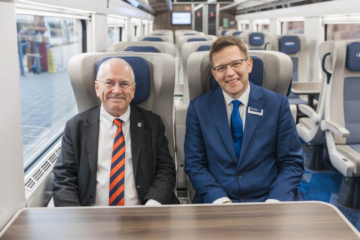 Richard Allan and Rail Minister,  Lord Peter Hendy on board the Mark 5A train