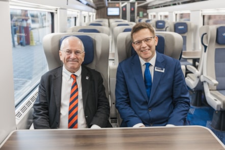 Richard Allan and Rail Minister,  Lord Peter Hendy on board the Mark 5A train