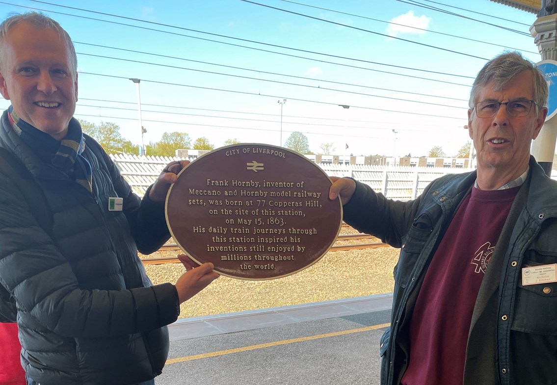 The moment the original Frank Hornby plaque was handed over to the Railway Heritage Trust after being found