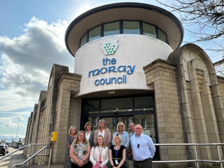 Five Moray Council officers, the Career Ready Regional Manager, two interns, and a Lossie High School Career Ready Co-ordinator are standing.