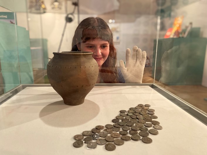 Money Talks hoards: Rachael Dilley, Leeds City Museum's curator of exhibitions, with the Boston Spa Hoard, made up of 172 silver denarii dating from around 119 BC to the reign of the Roman Emperor Hadrian. On loan to Leeds from The Yorkshire Museum.
