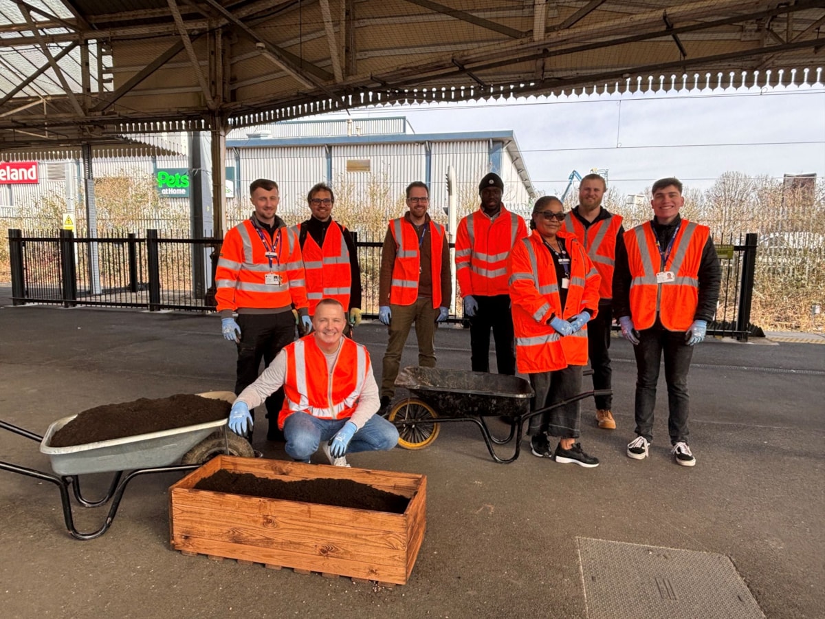 Image shows employees from Northern working at Bolton station