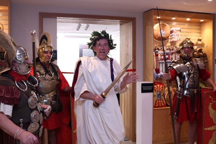 Toga Wearing Ben Miller opens Gladiators - A Cemetery of Secrets at Corinium Museum (lr)