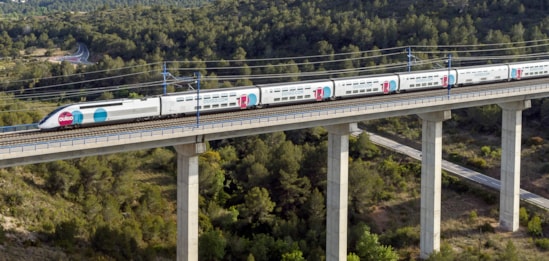 High speed TGV train crosses viaduct: © Ouigo