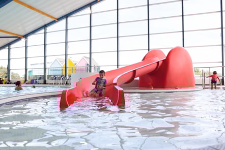 Indoor pool slide at Quay West