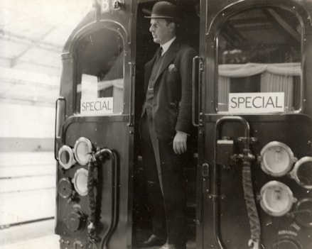 Junior Transport Secretary J T C Moore-Brabazon in the first train to arrive at Morden (c) LTM
