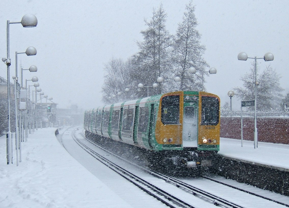 Snow and ice treatment trains ready to keep passengers moving during winter weather: 313 Southern train in snow