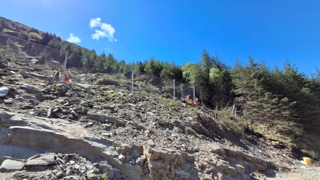 A 40m long anchored catch fence will reduce the rock fall risk to track and road users.