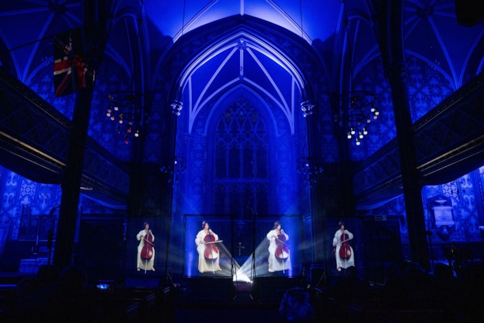 Eternal Ensemble by ONYVA! Studio: 'Eternal Ensemble' will be shown at Leeds Minster.

As a cellist appears to perform across multiple points, spatial audio and immersive projection repeat, layer and transform the performance, surrounding each listener with sound and image.