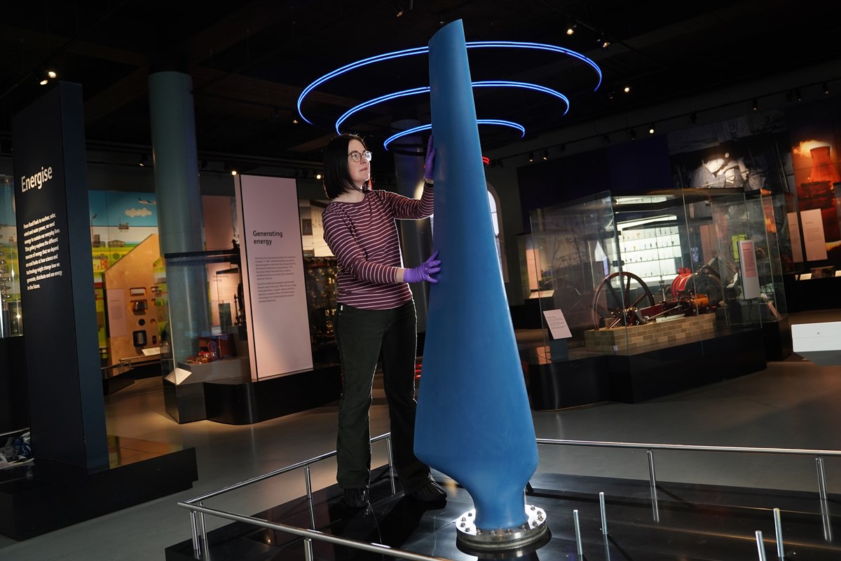 Curator Ellie Swinbank installs the Nova tidal turbine blade at the  National Museum of Scotland. Image © Stewart Attwood (3) | National Museums  Scotland News