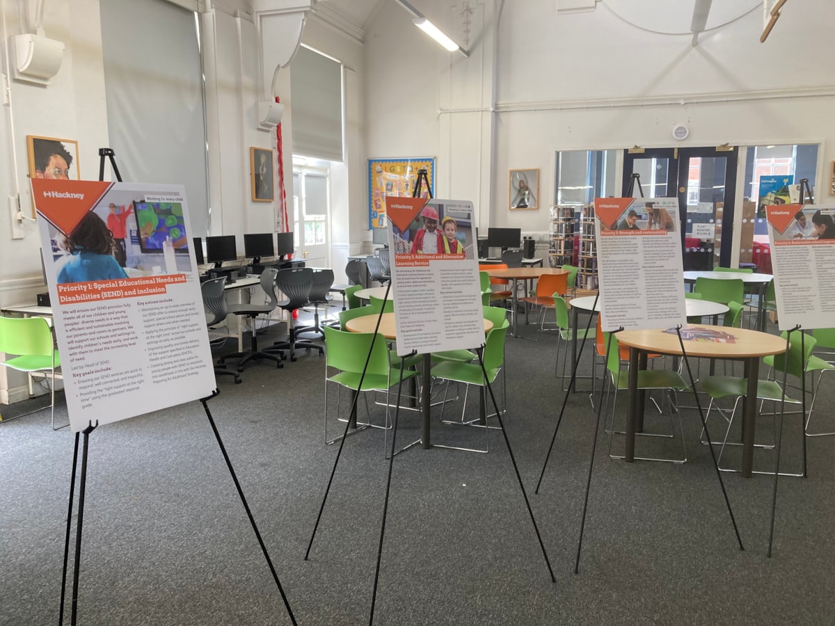 Four displays summarising the first four priorities of the new Education Strategic Plan as presented during a consultation event in 2025 in one of the Hackney schools' libraries