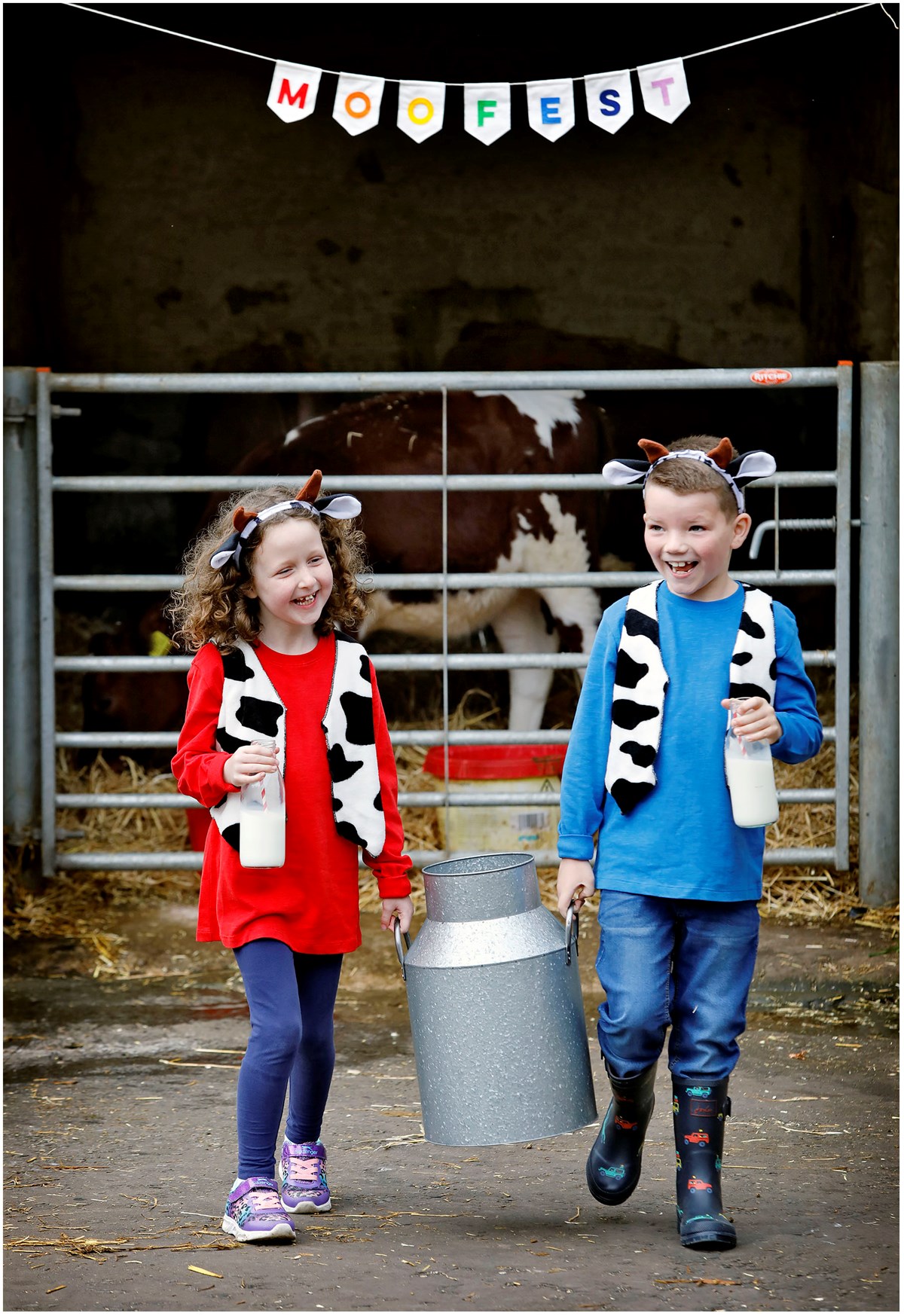 Emily Birrell and Harry Anderson from Mossneuk Primary get ready for MooFest at National Museum of Rural Life in East Kilbride this Saturday 16 and Sunday 17 September.  Supported by Players of People’s Postcode Lottery, the fun family event is a unique celebration of cattle featuring butterchurning workshops, demonstrations, trails, storytelling, crafts and food. Image credit: Paul Dodds.