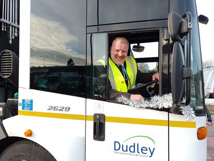 cllr damian corfield driving a bin lorry for christmas