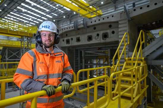 Engineer in front of the first segment of the UK's longest viaduct: Colne Valley Viaduct precast factory