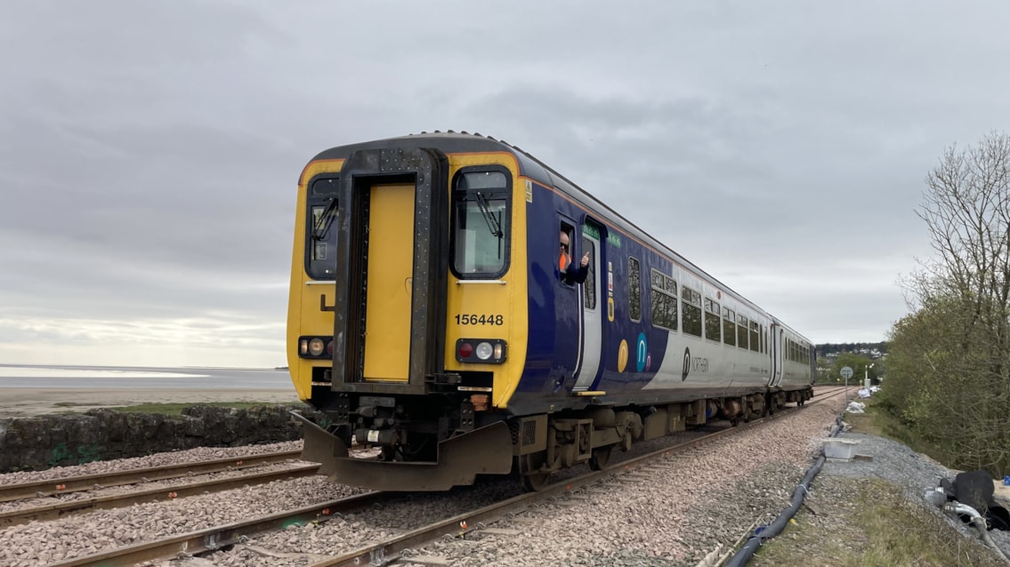 Thumbs up! A Northern train travelling through Grange-over-Sands