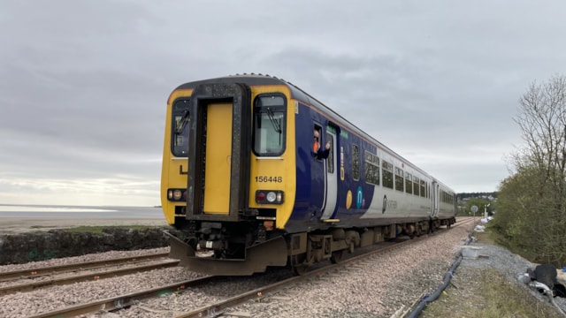 A Northern train travelling through Grange-over-Sands: A Northern train travelling through Grange-over-Sands