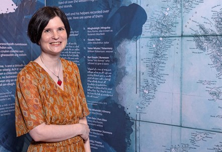 Gàidhlig Storymaker Kirsty MacDonald pictured in the Library's Sgeul I Story exhibition. Image credit Neil Hanna.