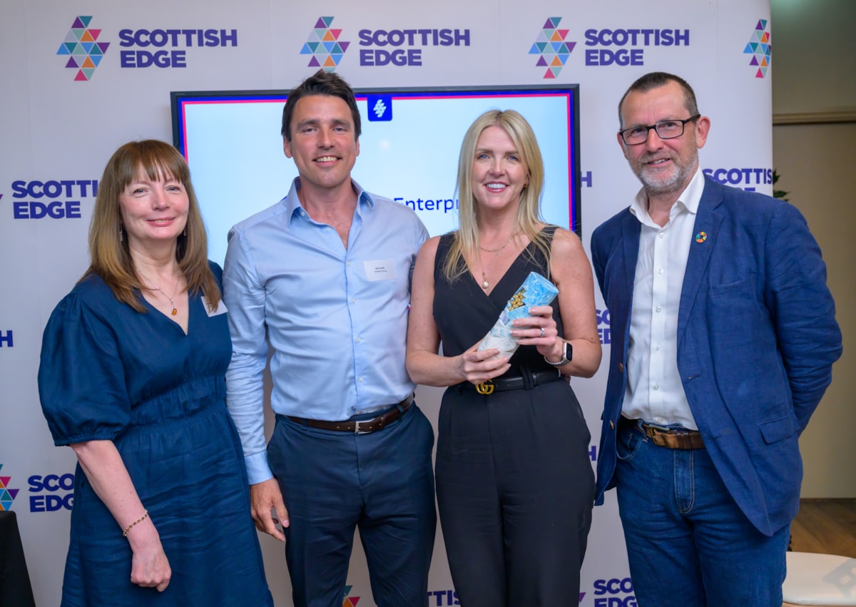 Missions EDGE Winner - Joe & Gillian Lane (C) with Marjory Sweeny of SE (L) 