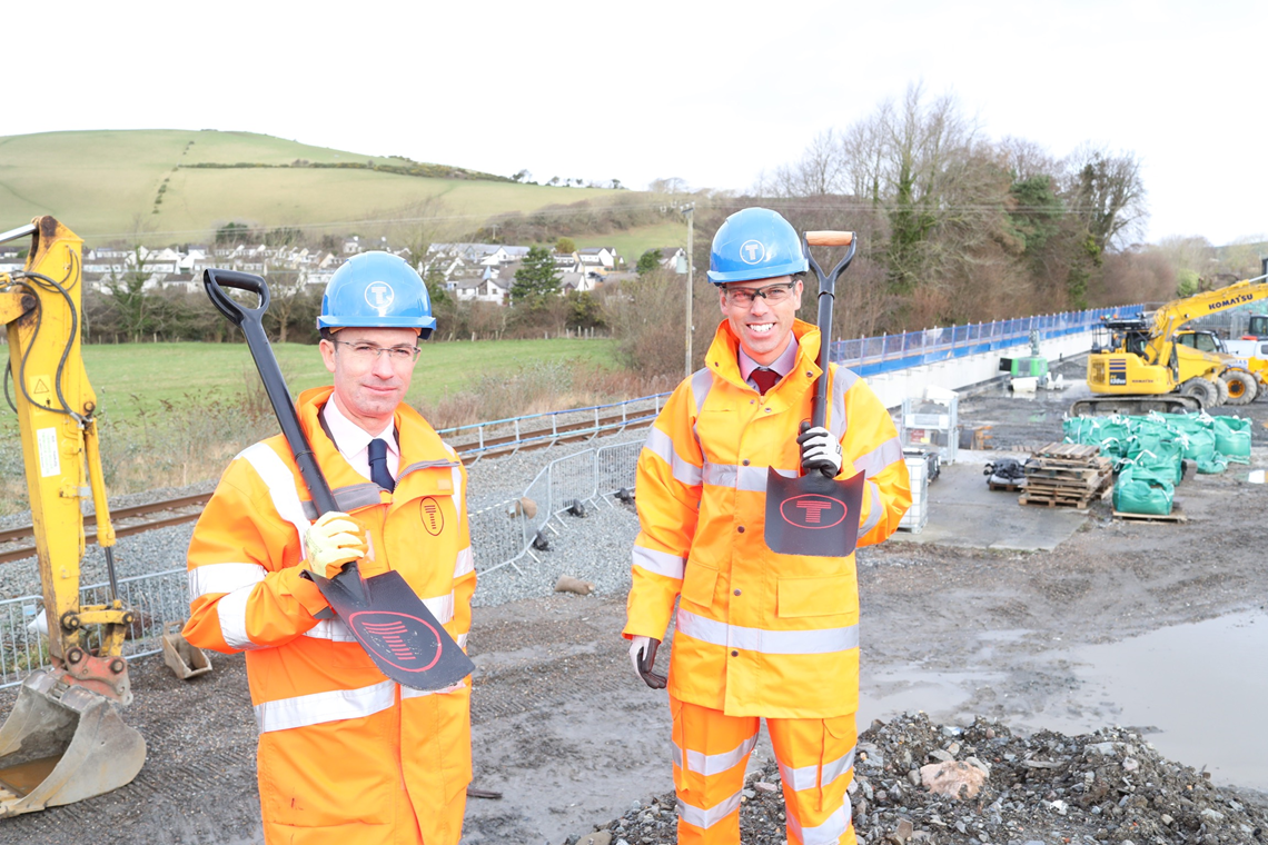 James and Ken holding shovels