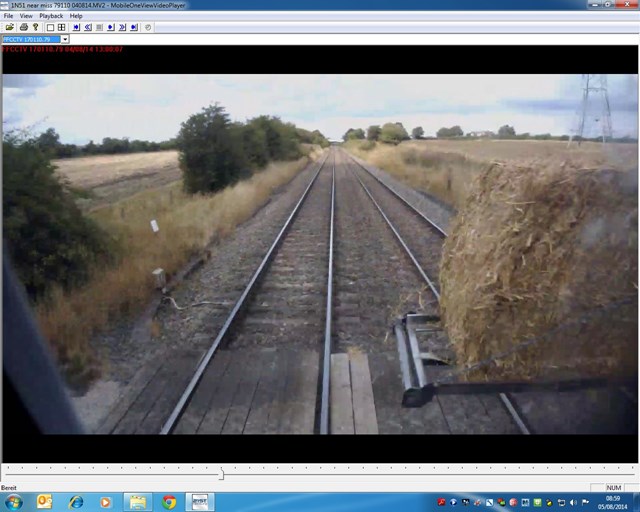 Freeze frame of near miss with tractor at level crossing